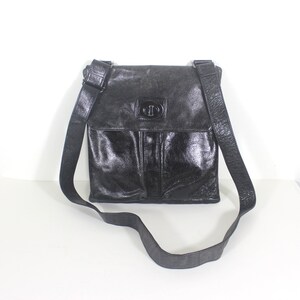 danier leather black leather backpack EMILE Genuine  Carry your essentials in style with the RiderForge Touring Backpack with Studs UPDATED TOURING BACK PACK