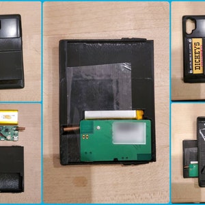 May include: A black phone case with a rectangular design, shown with a disassembled circuit board, battery, and a separate black component. The image also includes a component with the text "DICKEYS" on a yellow background.