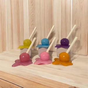 Handcrafted Resin Melting Lollipop Paperweight: Unique Desk Decor
