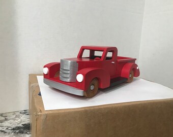 antique metal toy cars and trucks