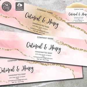May include: Pink and gold soap label design with the text "Oatmeal & Honey" and "Handcrafted Soap". The label includes the company name, ingredients, and net weight of 4oz/113g. The design is customizable.