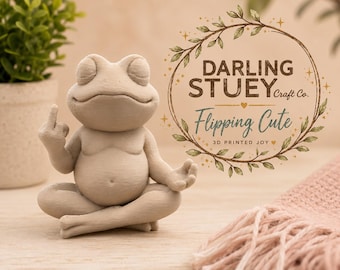 Frog Sculpture.  Middle finger and Peace.