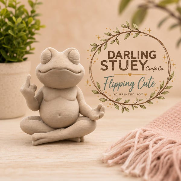 Frog Sculpture.  Middle finger and Peace.