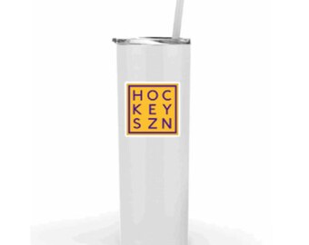 May include: White insulated tumbler with a silver lid and a straw. The tumbler has a square sticker with the text "HOCKEY SZN" in yellow letters on a purple background. A great gift for hockey fans.