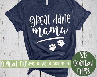 May include: Navy blue t-shirt with the words "great dane mama" in white script, along with two white paw prints. The shirt also has the text "Digital File: PNG, SVG, Sublimation" in a green banner and a green circle with the words "SB Digital Files".