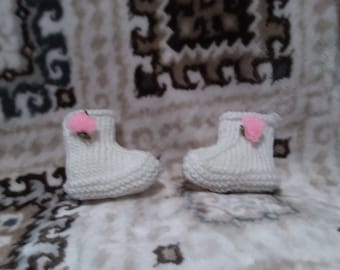 Adorable knitted baby booties