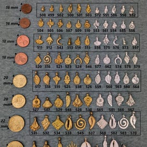 May include: A chart of gold and silver charms for jewelry making. The charms are arranged in rows by size, from 16 mm to 24 mm. The charms feature a variety of designs, including leaves, shells, and geometric shapes.
