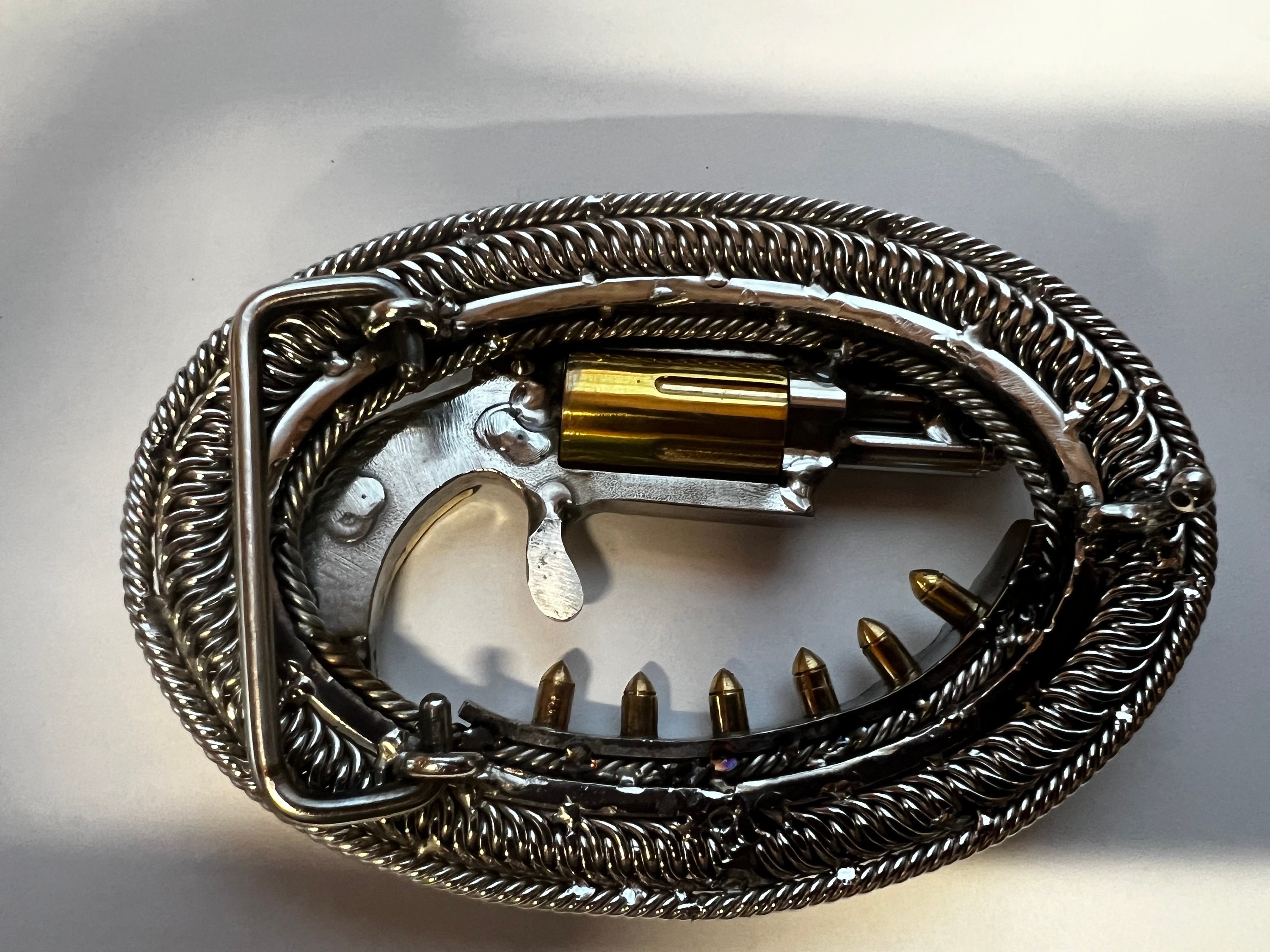 New faux revolver belt buckle approximately 3.75\