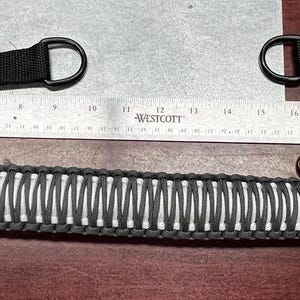 Correa para lonchera de paracord hecha a mano y personalizada.