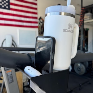 Portavasos / Teléfono / Auriculares Assault Runner