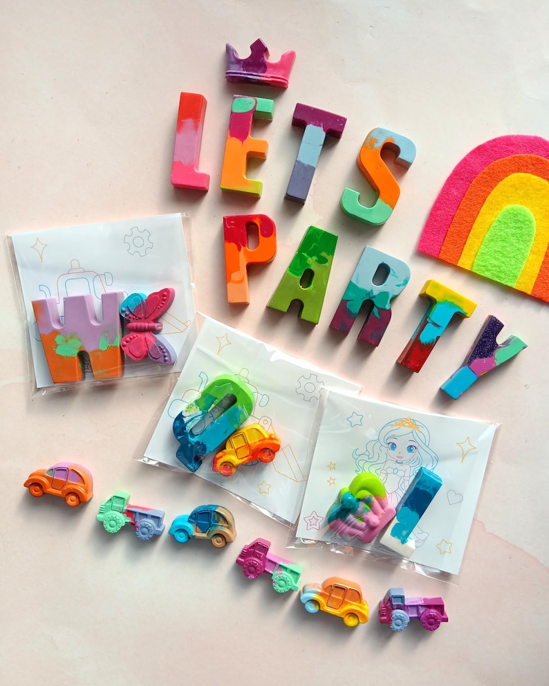 Colorful handmade crayons in shapes of letters,cars, butterflies, and more with fun coloring kits. Perfect for kids' party favors, themed birthdays, creative play, school events, and educational gifts. Includes vibrant designs and non-toxic materials