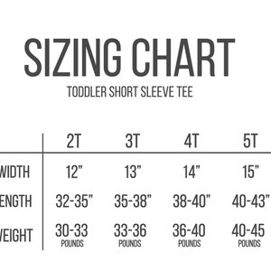 May include: A white sizing chart for toddler short sleeve tees. The chart includes measurements for width, length, and weight in inches and pounds for sizes 2T, 3T, 4T, and 5T. The text "SIZING CHART" is at the top.