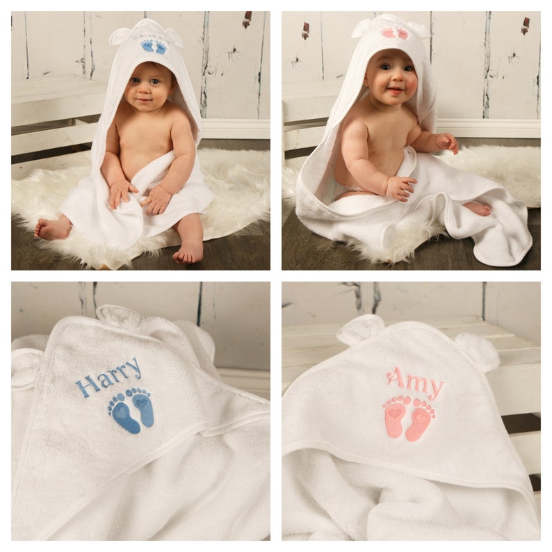 May include: White hooded baby towel with embroidered footprints and the name "Harry" in blue. The towel has small bear ears on the hood. Another towel has the name "Amy" in pink with pink footprints.