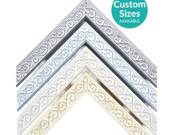 May include: Three stacked corner sections of picture frame molding in silver, white, and gold finishes. Each frame features an intricate embossed scrollwork pattern along the outer edge. A teal circular badge displays the text Custom Sizes AVAILABLE.
