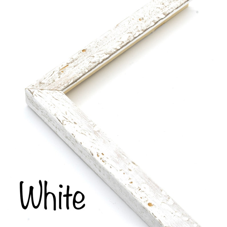 May include: White painted wooden picture frame with a distressed finish. The frame is shown in a corner view.