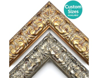May include: Two ornate picture frames with a gold and silver finish. The frames have a detailed floral design. Custom sizes are available.