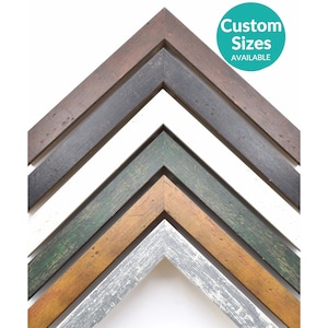 May include: Five different wood picture frames with distressed paint finishes. The frames are arranged in a pyramid shape with the largest frame at the top and the smallest frame at the bottom. The frames are painted in shades of brown, gray, white, green, and gold.  Custom Sizes Available.