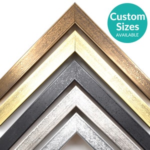 May include: Six different picture frames with a textured finish. The frames are arranged in a pyramid shape with the largest frame at the top and the smallest frame at the bottom. The frames are available in gold, silver, and black.