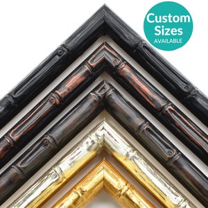 May include: Four different bamboo-style picture frames in black, copper, silver, and gold.  The frames are arranged in a pyramid shape with the black frame at the top and the gold frame at the bottom.  Custom sizes available.