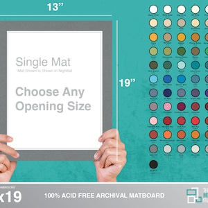 May include: A 13x19 inch single mat board with a gray mat and a white core. The mat board is 100% acid free archival. The mat board is shown in the color Nightfall. The text "Choose Any Opening Size" is printed on the mat board. The mat board is held by two hands.