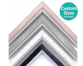 May include: Four different picture frame corners in various colors, including pink, gray, white, and black. The frames have a distressed wood finish. Custom sizes are available.