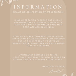 May include: A beige background with white floral illustrations and text that reads "INFORMATION" and "D&Eacute;LAIS DE CONFECTION ET D'EXP&Eacute;DITION". The text continues with information about the creation process and shipping times. The text ends with "MERCI PAR AVANCE... Ana&euml;lle".