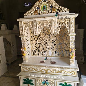 Handcrafted White Marble Temple: Peacock & Floral Carvings, Pooja Mandir with Storage