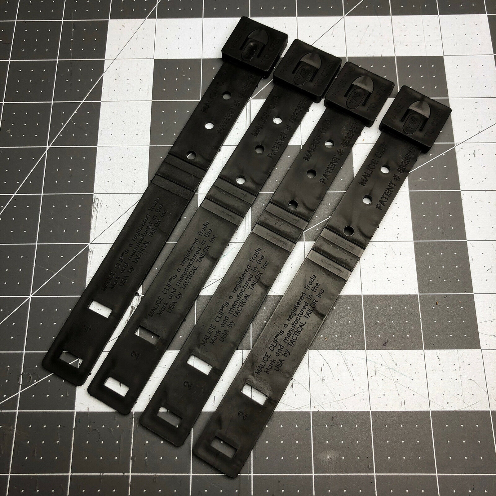 Tactical Tailor Malice Clips Available in Black or Coyote Pack of 4 Short