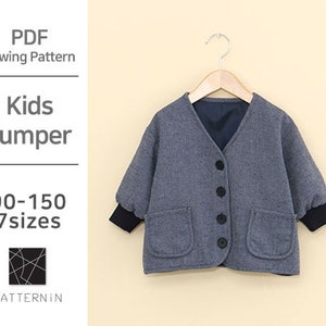 May include: A gray V-neck kids jumper with long sleeves, black cuffs, four black buttons, and two front pockets. The text reads: PDF Sewing Pattern, Kids Jumper, 90-150 7sizes, and PATTERNIN with a black square logo containing white lines.