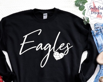 May include: Black sweatshirt with white text that says "Eagles" and a white volleyball in a heart shape.