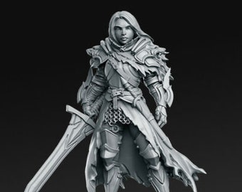 May include: A grey painted miniature figurine of a female warrior wearing armour and holding a sword. The figurine is standing on a round base.