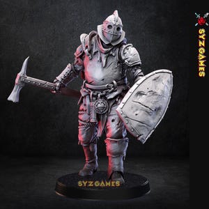 May include: A detailed figurine of a knight in weathered armor, holding a pickaxe and shield. The knight is standing on a black base. The shield has a textured surface. The figurine is a light gray color.
