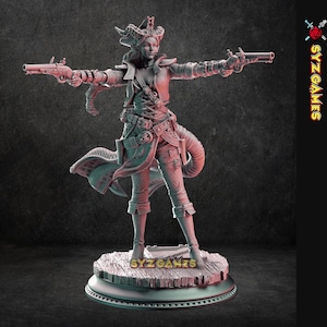 May include: A detailed figurine of a female pirate, holding two pistols with outstretched arms. The figure wears a detailed outfit with a coat, corset, and boots. The base of the figurine has the text "SYZ GAMES".