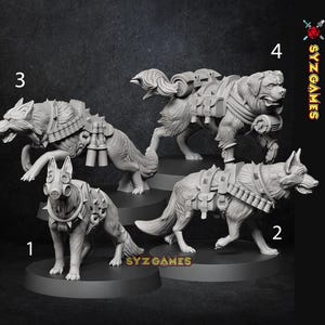 May include: Four detailed miniature dog figurines, each with unique armour and accessories. One dog wears a gas mask, while others have packs and harnesses. The figurines are on circular bases, with the "SYZ GAMES" logo visible.