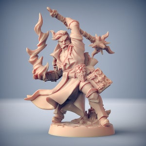 May include: A miniature figurine of a fantasy character wielding a flaming staff. The character is wearing a long coat and armor, and has a determined expression on their face.