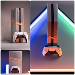 Könnte beinhalten: Eine grau-orangefarbene Spielekonsole mit einem weißen Controller. Die Konsole hat ein vertikales Design mit rechteckiger Form und einem horizontalen orangefarbenen Streifen. Der Controller ist weiß mit schwarzen Akzenten und Knöpfen. Das Thema ist modernes Gaming.