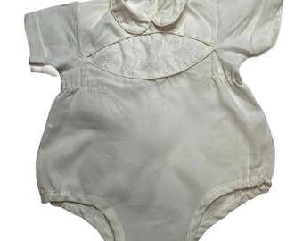 Mono unisex vintage de poliéster ligero con cierre de broches en la entrepierna, estilo años 50.