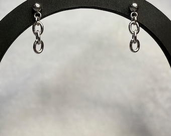 Puces d'oreilles minimalistas e acier inoxidável