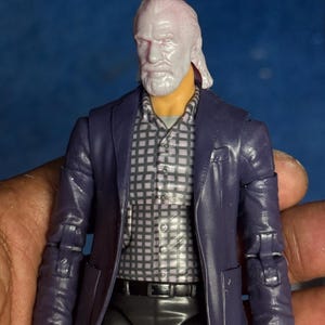 A figura do negociador (sem pintura) não está incluída