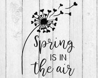 Könnte beinhalten: Schwarze und weiße Silhouette eines Löwenzahns mit Herzen, die im Wind fliegen. Der Text "Spring is in the air" steht unter dem Löwenzahn.