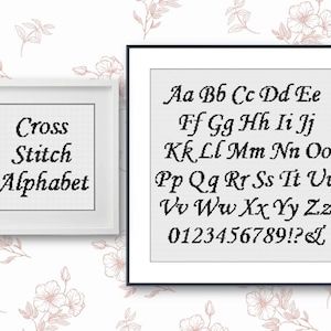 May include: A black and white cross stitch alphabet chart with the letters A through Z and the numbers 0 through 9, an exclamation point, a question mark, and an ampersand.