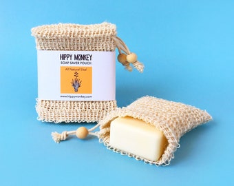 May include: Two natural fiber soap saver pouches with a bar of soap in one. The pouches are made of a natural material and have a drawstring closure. The label on the pouch reads "Hippy Monkey Soap Saver Pouch All Natural Sisal www.hippymonkey.com"