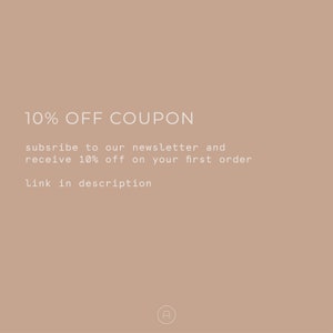 May include: Text on a beige background that reads "10% OFF COUPON subscribe to our newsletter and receive 10% off on your first order link in description" with the letter "A" in a circle at the bottom.