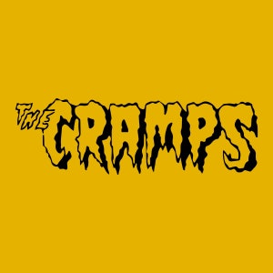 May include: Black and white logo of the band "The Cramps" on a yellow background.