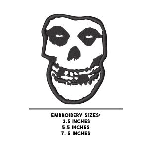 May include: Black and white embroidered patch of a smiling skull with eye sockets and a toothy grin. The patch is available in three sizes: 3.5 inches, 5.5 inches, and 7.5 inches.