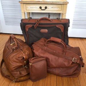 Complete collection of vintage Coach leather Cabin travel bags, in British Tan, USA 1990s
