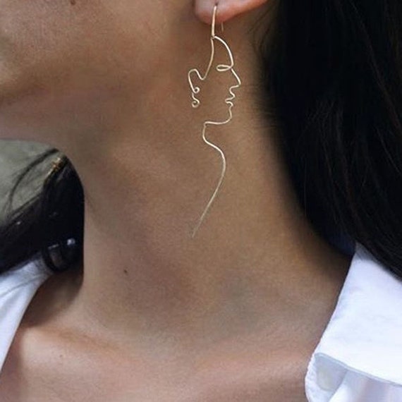 Gold wire deals face earrings