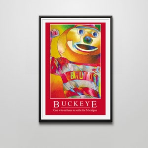 May include: A colourful illustration of Brutus Buckeye, the mascot of Ohio State University. He is wearing a red and white striped shirt with the word "BRUTUS" on it. The text below the image reads "BUCKEYE One who refuses to settle for Michigan."
