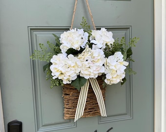 ivory hydrangea woven hanging basket floral decor for front door / classic chic summer rattan basket + maidenhair fern