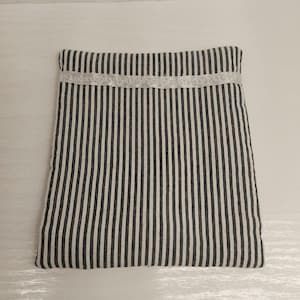 Bedding to dollhouse bed.